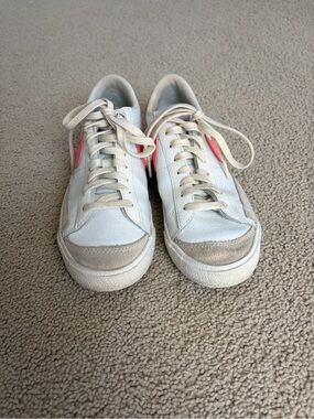 Nike White Leather Low-Top Sneakers with Pink Swoosh